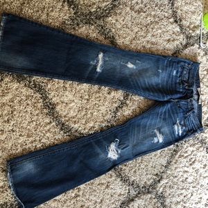 Ripped boot cut jeans